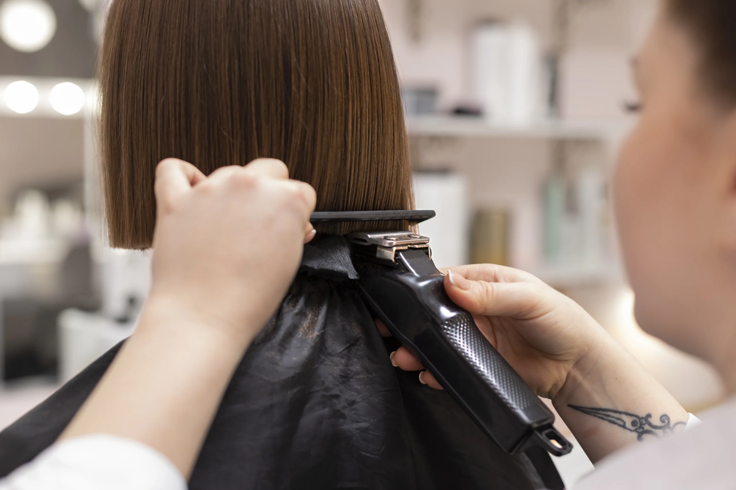 woman getting treatment hairdresser shop scaled